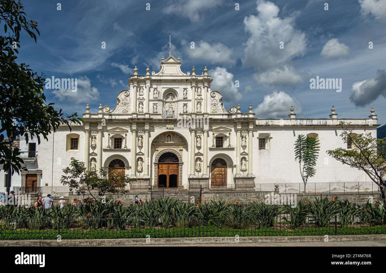 Historic central square in Totonicapán, Guatemala, showing civic buildings and church exterior