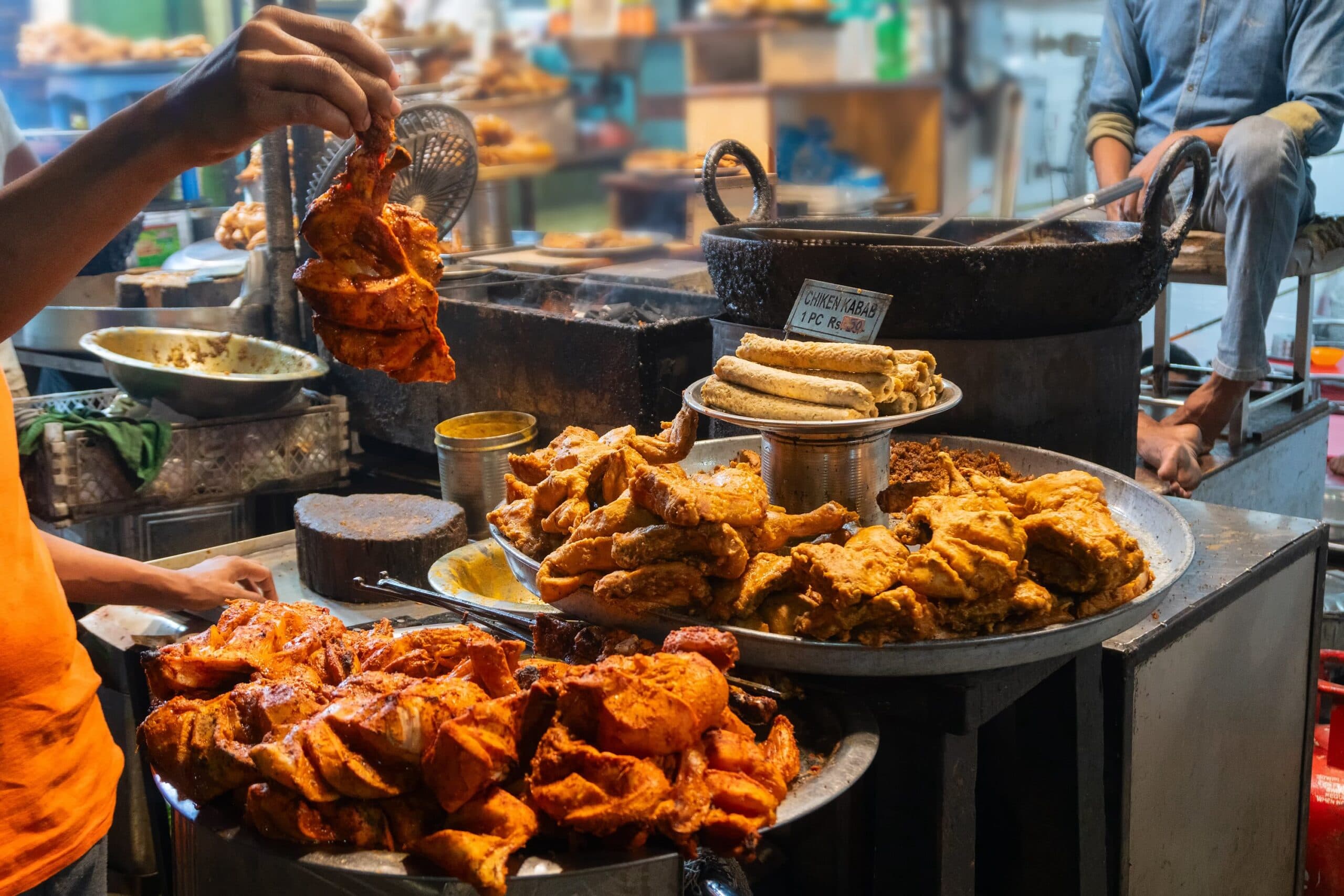 Hygienic street food practices in Asia, including clean utensils and food display methods