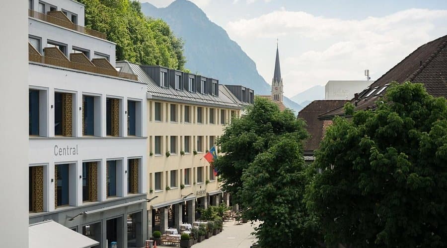 Modern building exterior of a hotel in Vaduz with architectural facade details