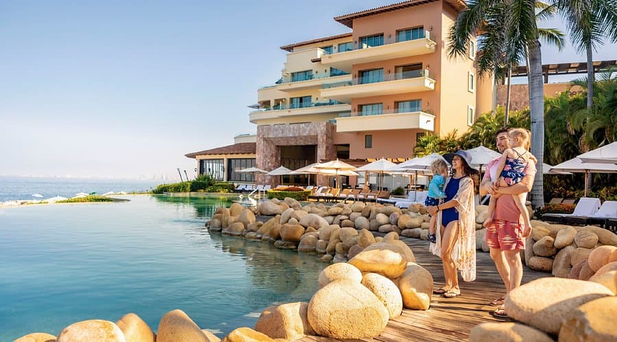 Family enjoying a resort stay with booking packages and positive guest reviews