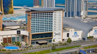 Modern hotel and mall building exterior at City Centre Bahrain