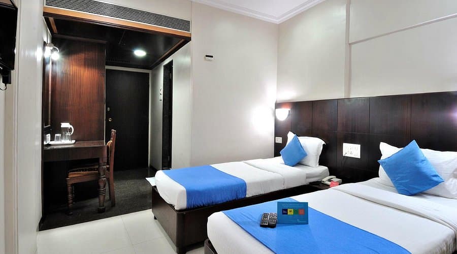 Exterior view of a typical 3-star hotel, showcasing clean architecture and inviting entrance, ideal for budget-conscious travelers seeking comfort and value.