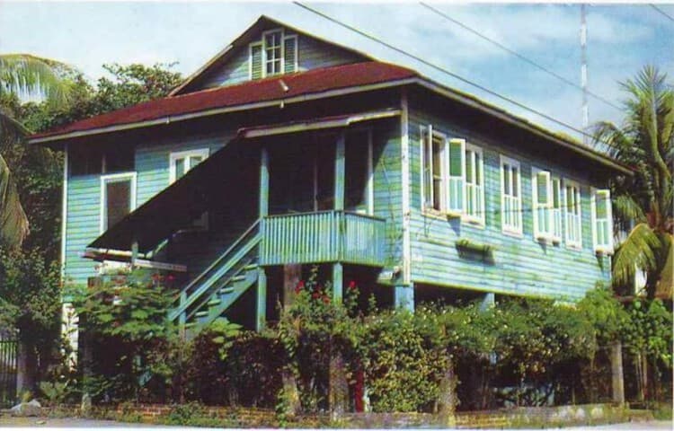Exterior of a traditional Honduran house with tropical architectural features