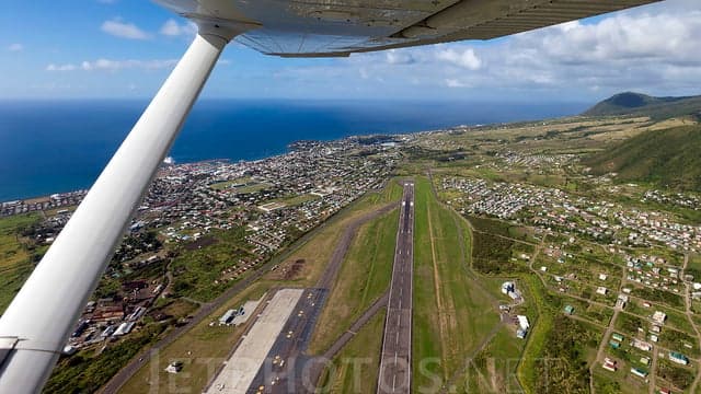 Aircraft on the tarmac at Robert L. Bradshaw International Airport in Saint Kitts