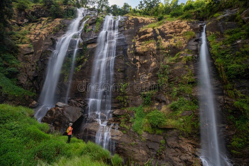 Towering limestone hills covered in dense green vegetation in Kayin State, Myanmar