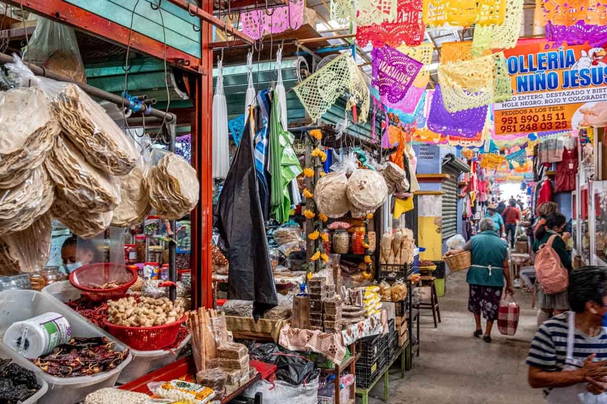 Colorful market stalls and architecture in a traditional Oaxacan town square