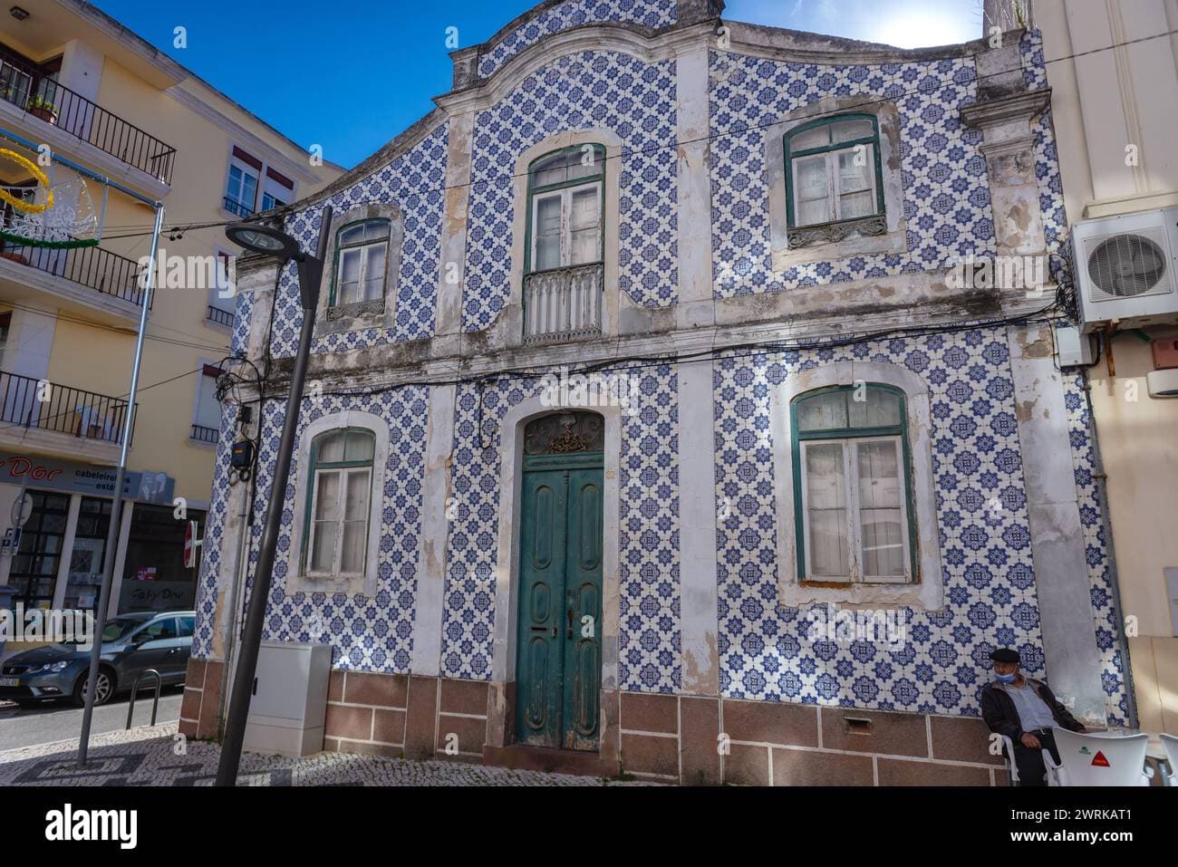 Building exterior decorated with traditional blue and white Portuguese tiles in Figueira da Foz