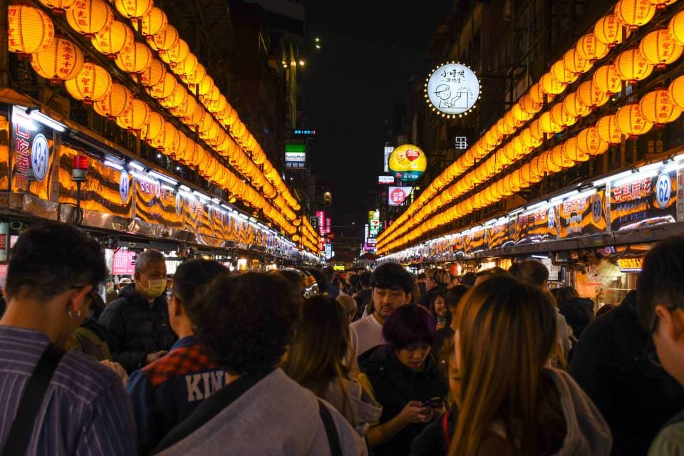 Exterior view of night market stalls in Keelung, Taiwan, offering local street food