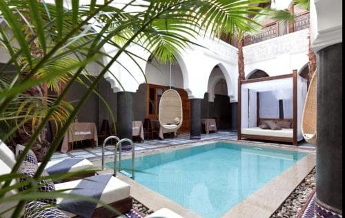 Exterior view of budget hotels and guesthouses in Morocco, suitable for winter travelers seeking affordable lodging
