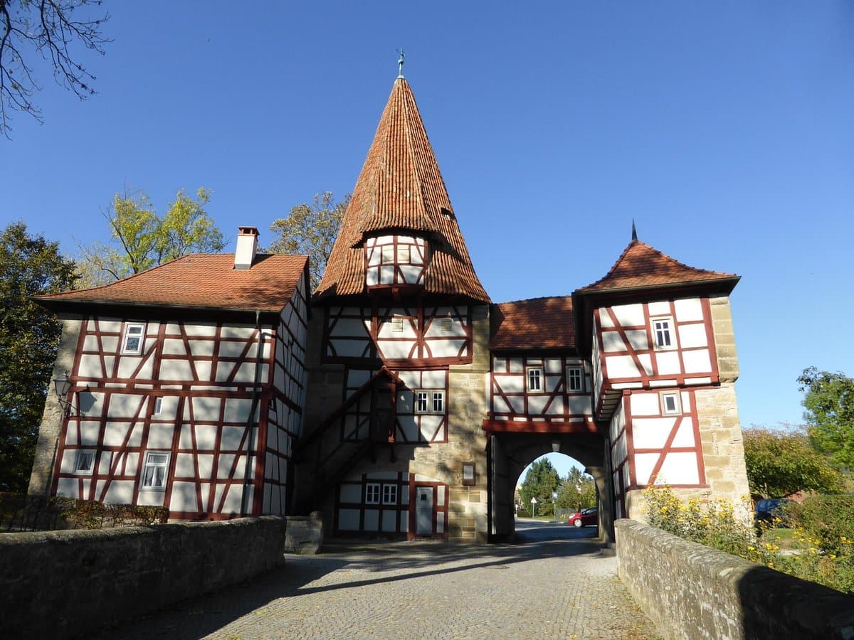 Exterior of the tourist information office in Iphofen, Germany, with adjacent historic buildings visible during spring