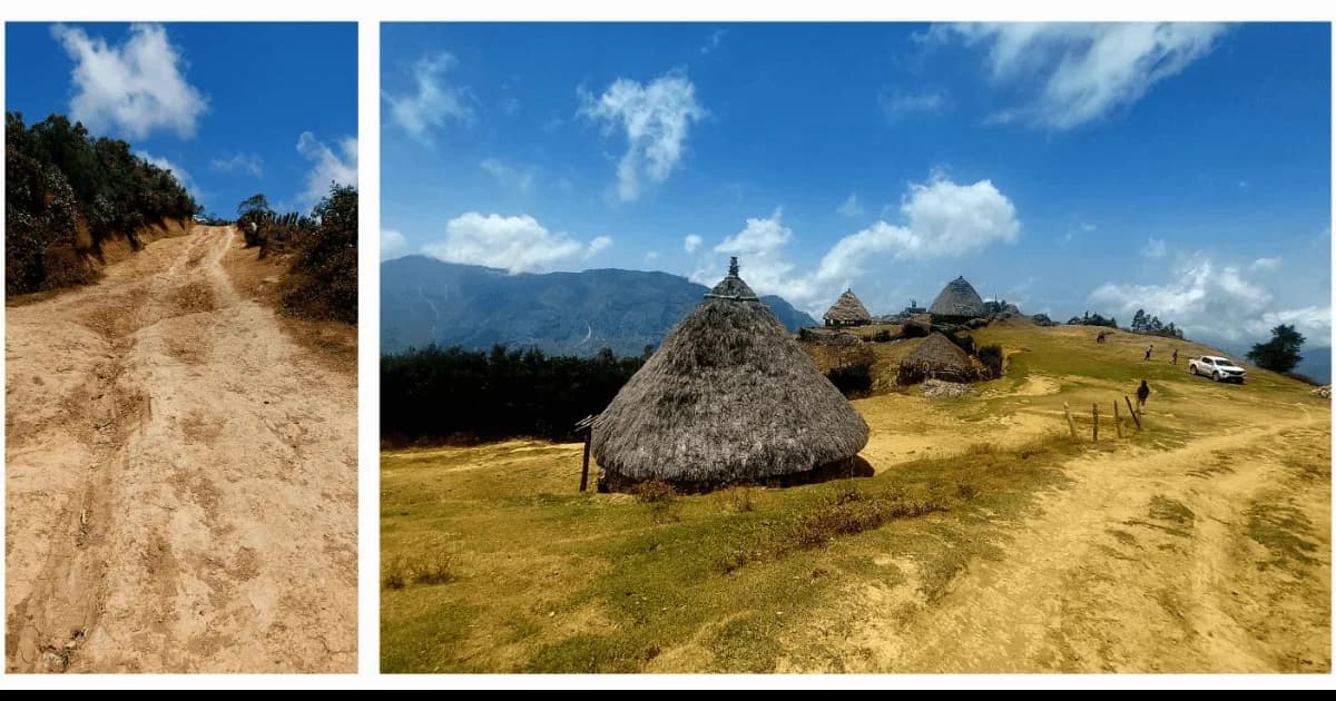 Scenic view of a dirt road through green hills in the Ermera district of East Timor